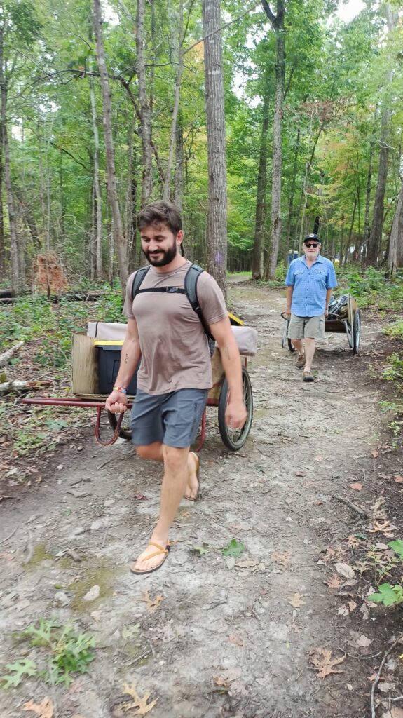 Dave and Marty from the FIC packing up their tents from the Twin Oaks Conference